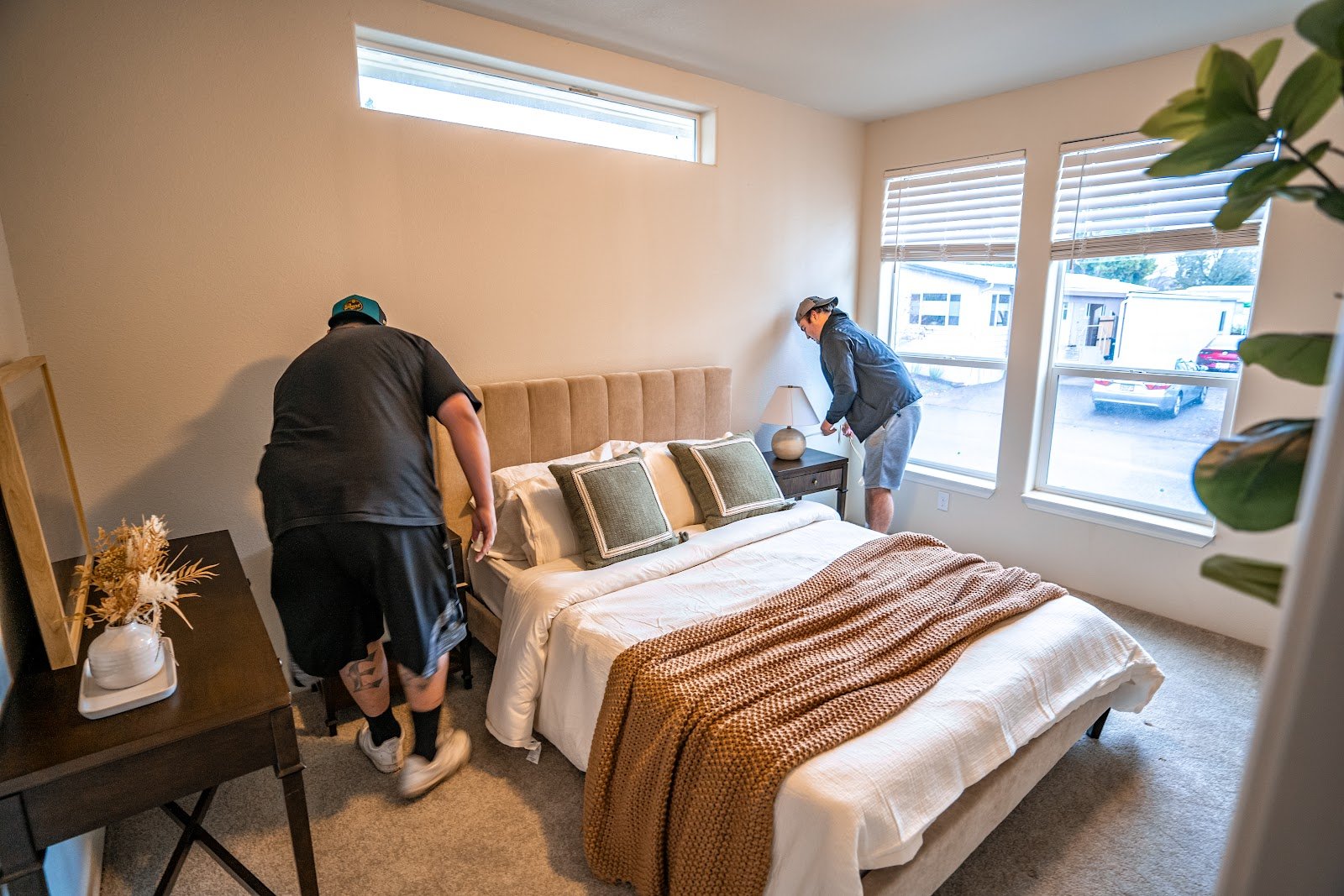 Packing Services 1 Moving Fellows crew packing a customer bedroom during a residential move